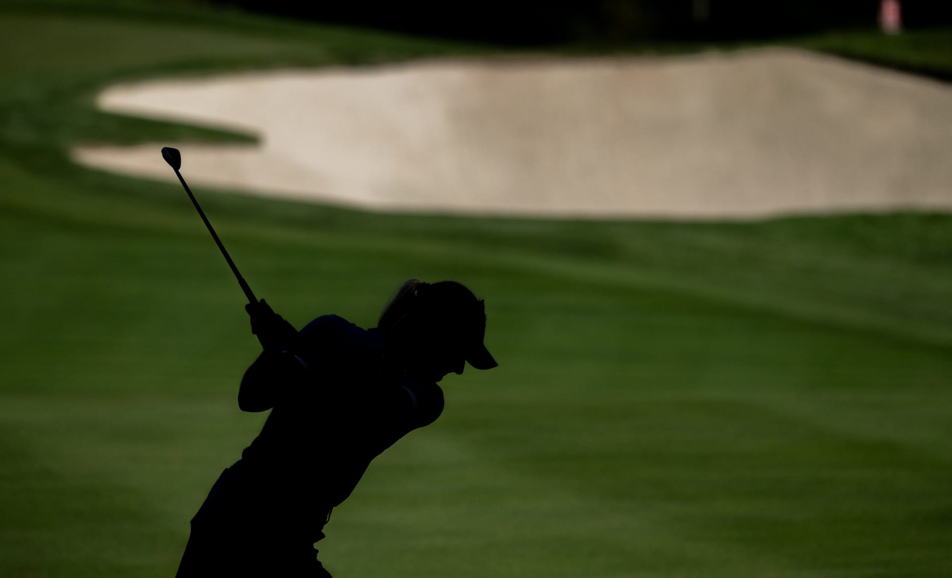 Woman playing on a golf course