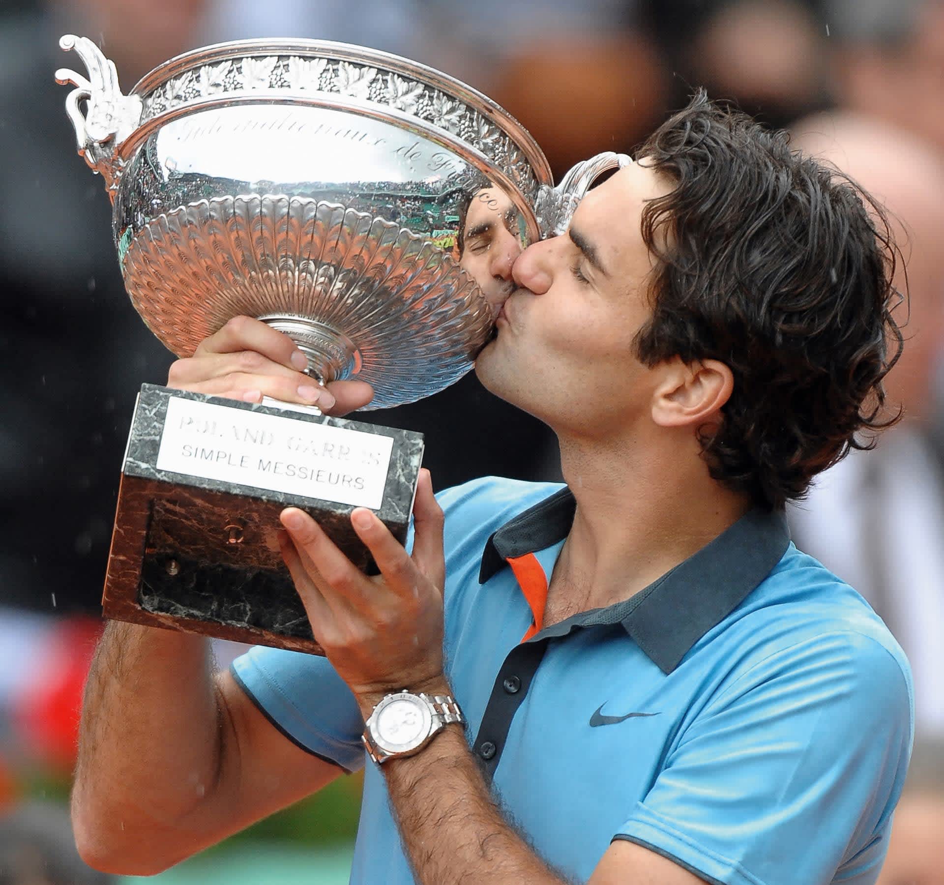 Roger Federer selepas memenangi Wimbledon, memakai Rolex Cosmograph Daytona