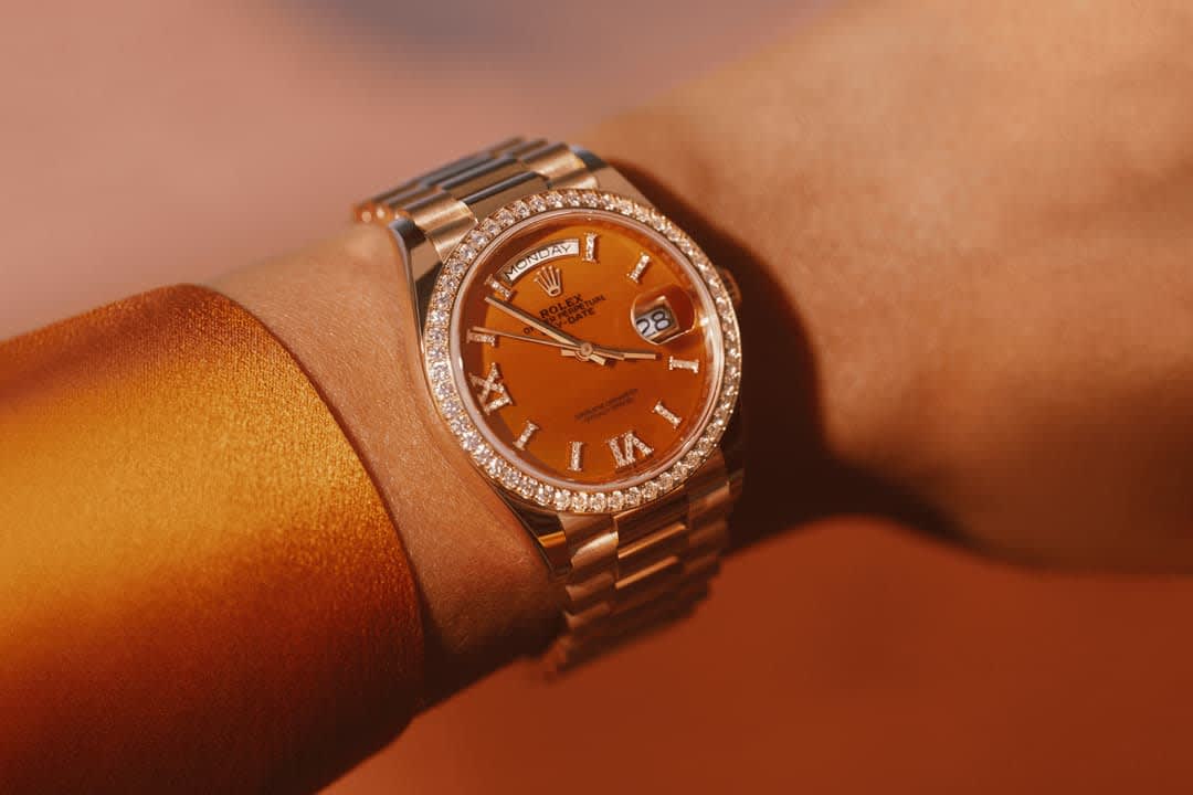 Orange face rolex clearance